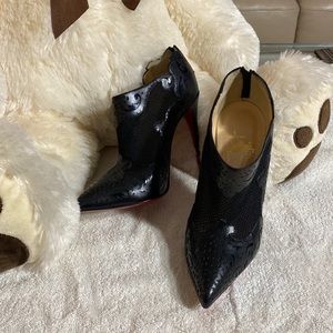 Christian Louboutin black booties.